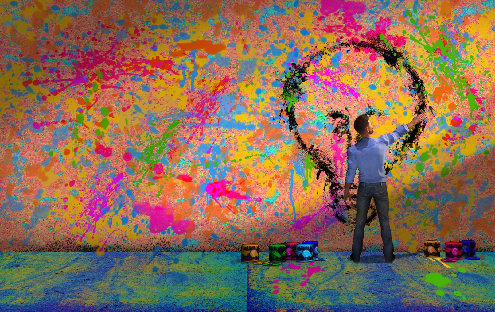 man painting a lightbulb image on a multicolored wall